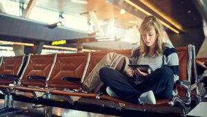 Female traveller waiting in departure lounge