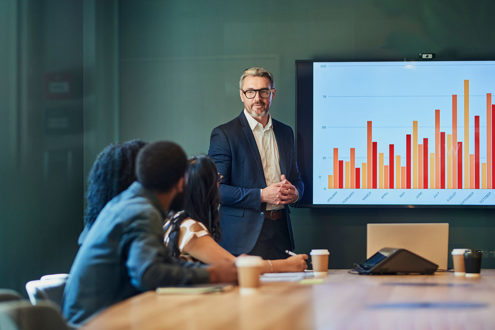 Employees analysing company performances
