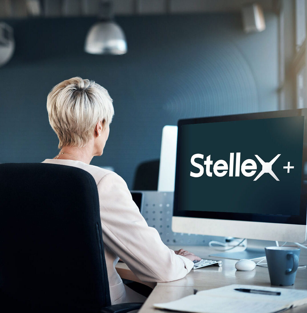 Female worker using office computer